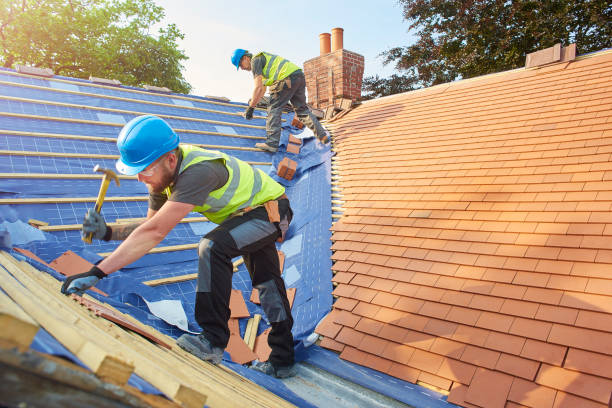 Two men working on a roof